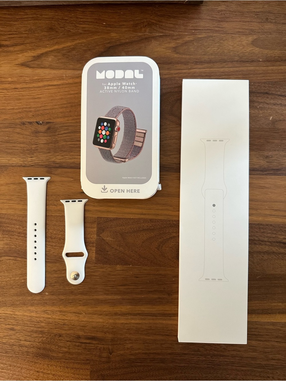 Lot of 3 — NWT 40mm Apple Watch band, NWOT 40mm Apple Watch band, and modal band